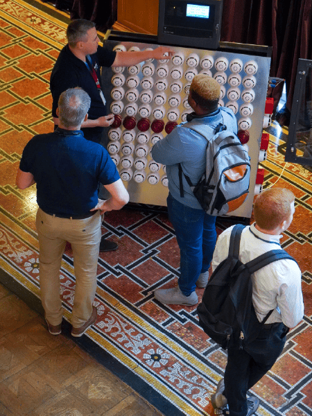 One of Protec's engineers showing a guest around the fat test